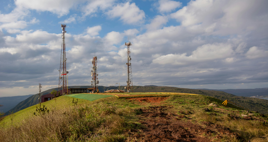 Image of three telecommunications masts on a hill